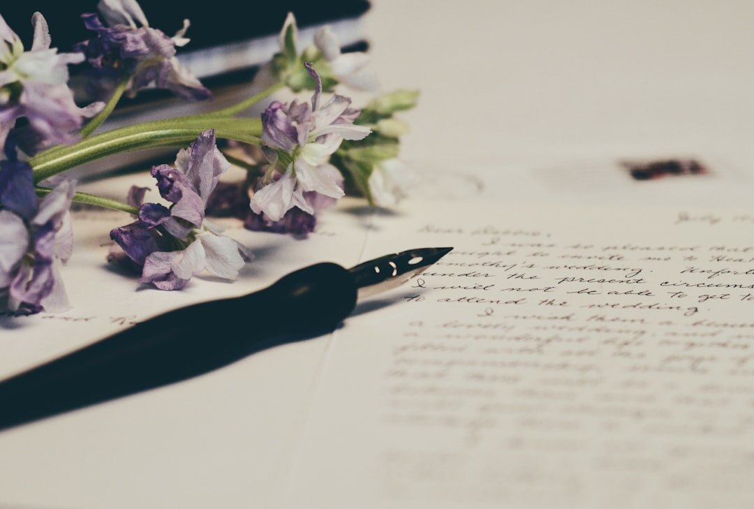 Fountain pen resting on a handwritten will document